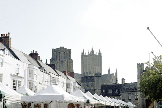 Stalls on a sunny day at Wells Market in Somerset