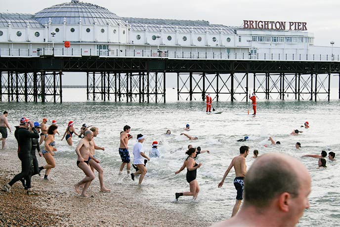 People running into the sea for the Brighton Christmas Day swim