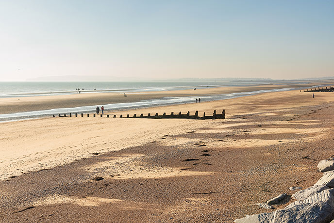 The reaching golden beach at Camber Sands in Sussex