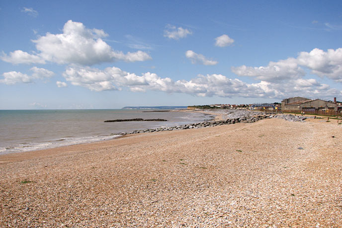 The wide, golden sandy beach at St Leonards on Sea in East Sussex
