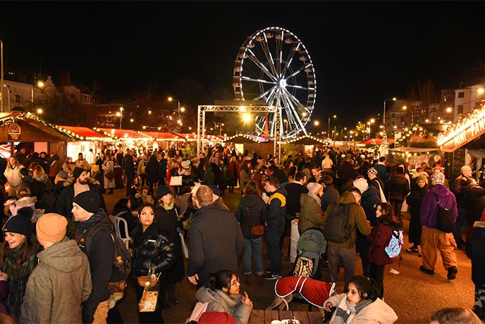 People bustling around the Brighton Christmas Market