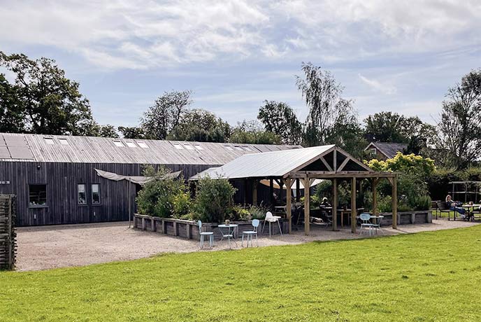 The barn-like exterior of Eggs to Apples Farm Shop in Sussex