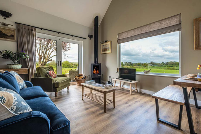 Cosy sitting room at Beacon Hill Barn