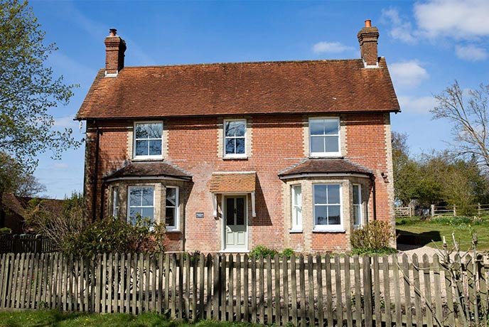 Red-bricked and idyllic, Whitehouse Farm is perfect for a dog-friendly holiday in Sussex