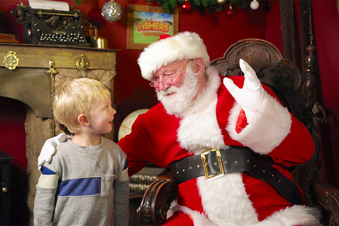 A child meeting Santa at Fishers Farm Park