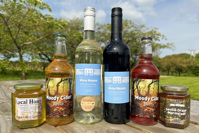 The selection of products offered by Jabajak Vineyard including, wines, ciders, and honey