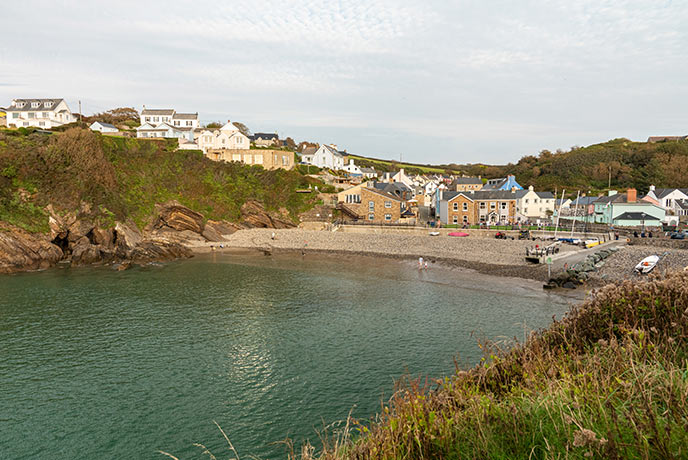 Looking across the bay at Little Haven with its pretty beach and quaint cottages in Pembrokeshire