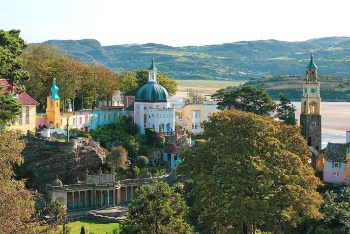 Looking down on the brightly coloured buildings and towers in Portmeirion in Wales