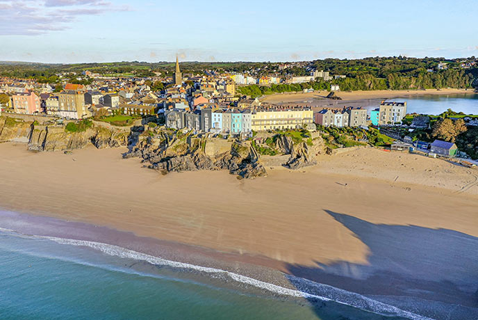 Just a snippet of Tenby South Beach along the Pembrokeshire National Coast with the colourful buildings of Tenby high above