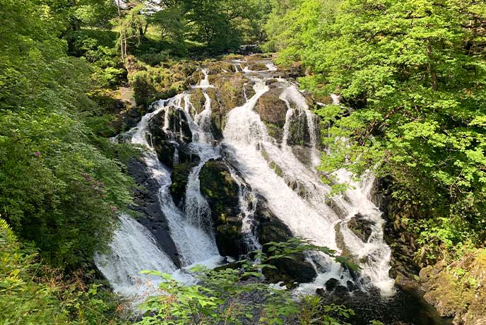 The famous series of waterfalls at Swallow Falls in Wales
