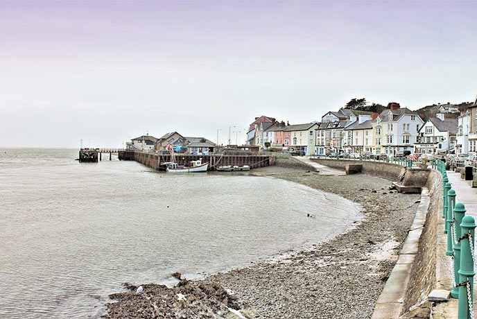 The pretty waterfront and pebbled beach of Aberdyfi in North Wales