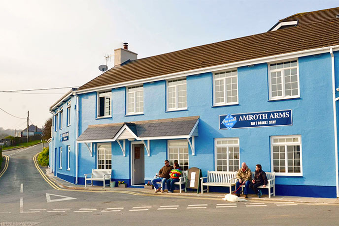 The bright blue exterior of the Amroth Arms in Pembrokeshire