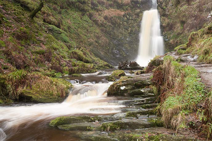 The flowing waters at Pistyll Rhaeadr waterfall in Wales