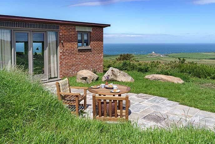The incredible al fresco dining table with reaching coastal views at Station A in Pembrokeshire
