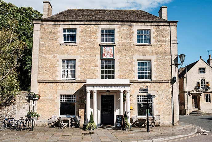 The smart stone exterior of The Methuen Arms in Wiltshire