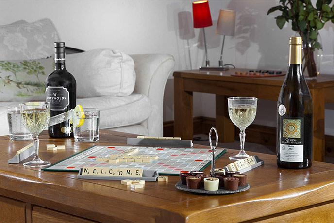 Scrabble and a bottle of bubbly at the Little Maunditts Cottage in Wiltshire