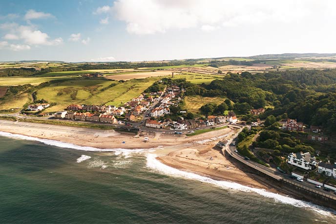 Golden sands and cliffs at Sandsend Beach in Yorkshire