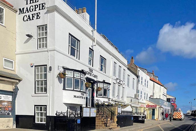The iconic white exterior of Magpie Café in Yorkshire