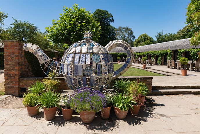 A metal sculpture of a teapot at Beningbrough Hall in Yorkshire