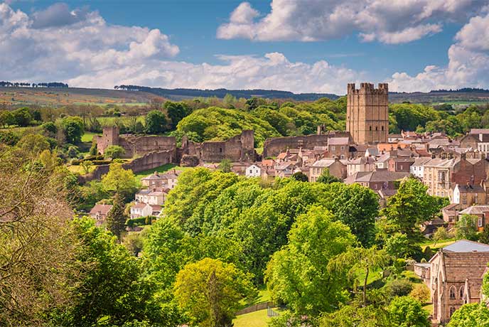 Looking over woodland to the town of Richmond in Yorkshire